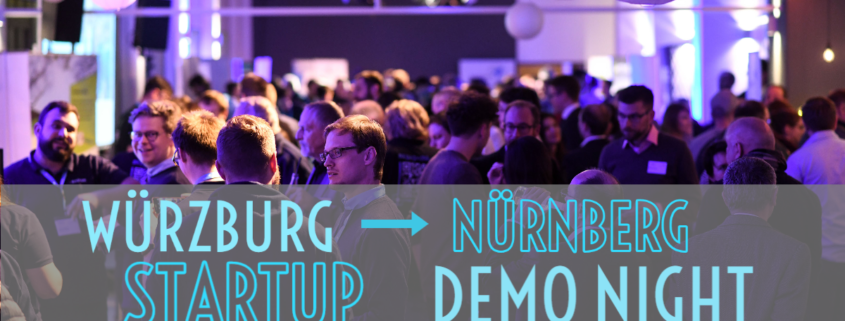 menschen in lila licht getaucht bei der startup demo night in nürnberg